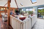 Vaulted ceilings and skylights make the room feel open and airy 